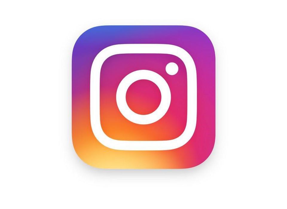 instagram logo design with a purple, yellow and orange gradient effect